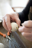 Threading a blown out egg