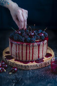 Vegan chocolate cake with fresh summer fruits