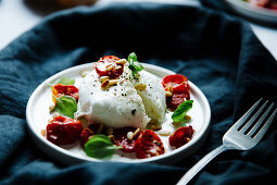Oven-dried tomatoes with mozzarella and basil