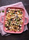 Oven baked celeriac with lemon and olives