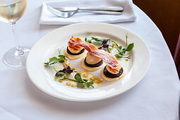 Black pudding, scallop, and bacon appetizers