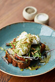 Poached eggs, mushrooms, sundried tomatoes, spinach, pesto and toasted pine nuts on toast