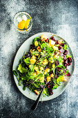 Healthy salad with grilled beetroot and salad leaves