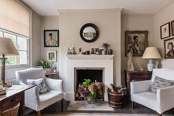 Upholstered armchairs with convex mirror