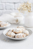 Pecan biscuits with icing sugar