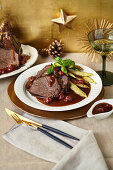Sauerbraten (marinated pot roast) with braised cherry broth and chia-and-herb potato orzo pasta