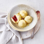 Cranberry dumplings made from sweet potato dough