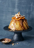 Brioche charlotte with orange mousse and coconut chips