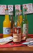 Beverage bottles with play money