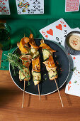 Chicken skewers with vegetables and peanut dip