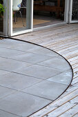 Terrace with concrete paving and wooden decking