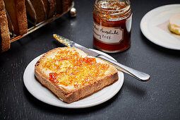 Homemade marmalade spread on toast