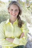 Boy, blonde woman in yellow blouse