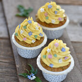 Vegan almond cupcakes with mango mascarpone topping