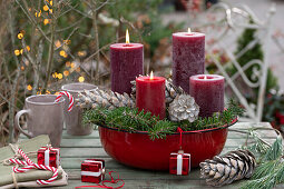 DIY Advent wreath in red enamel bowl