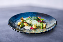 Cod with celery, green asparagus and gnocchi