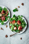 Lamb's lettuce with goat's cheese wrapped in bacon and walnuts