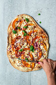 Quick tarte flambée with pumpkin and feta