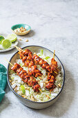 Coconut cashew rice with sticky chicken skewers