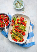 Courgette and feta parcels with tomato salsa