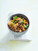 Sweet potato vermicelli with chilli poultry mince, peanuts and sweetcorn