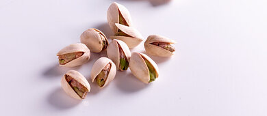 Pistachios on a light background