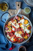 Chorizo fried with vegetables and mozzarella cheese