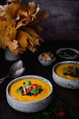 Pumpkin soup with croutons, coriander and chilli
