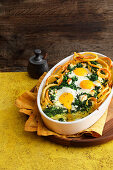 Macaroni casserole with spinach and egg
