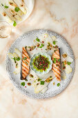 Grilled salmon with asparagus carpaccio in pink pepper marinade