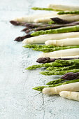 White, green and purple asparagus spears