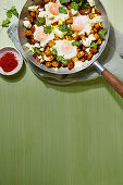 Spiced potatoes with eggs and feta