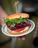 BBQ burger with red onion relish and blue cheese