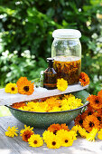 Natural remedies made from calendula: oil, tincture and footbath