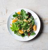 Vegan wild herb salad with mandarins