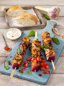 Grilled turkey kebabs with red onions