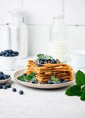 Crêpes with blueberries and honey