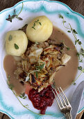 Cabbage pudding with potatoes and cranberries