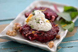 Walnut and beet patties with feta and orange