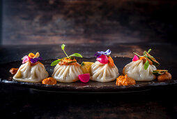 Chicken momos (steamed dumplings, India)