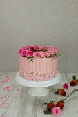 Rosy strawberry dripping cake