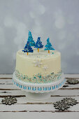 Wintery nougat cake with fir tree decorations