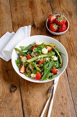 Green asparagus salad with strawberries