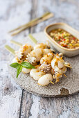 Grilled baby squid with spicy dip