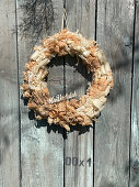 Autumn wreath made of wood shavings