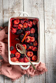 Plums and blackberries roasted with spices