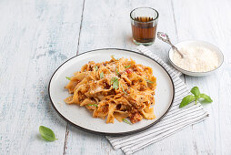 Pasta with vegan cauliflower bolognese and vegan parmesan substitute