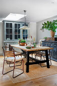 Large table with chairs made of wood and metal in the dining area