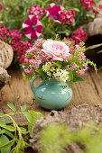 Posy of spiraea, rose and carnations