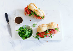 Serrano sandwich with tomatoes and rocket salad